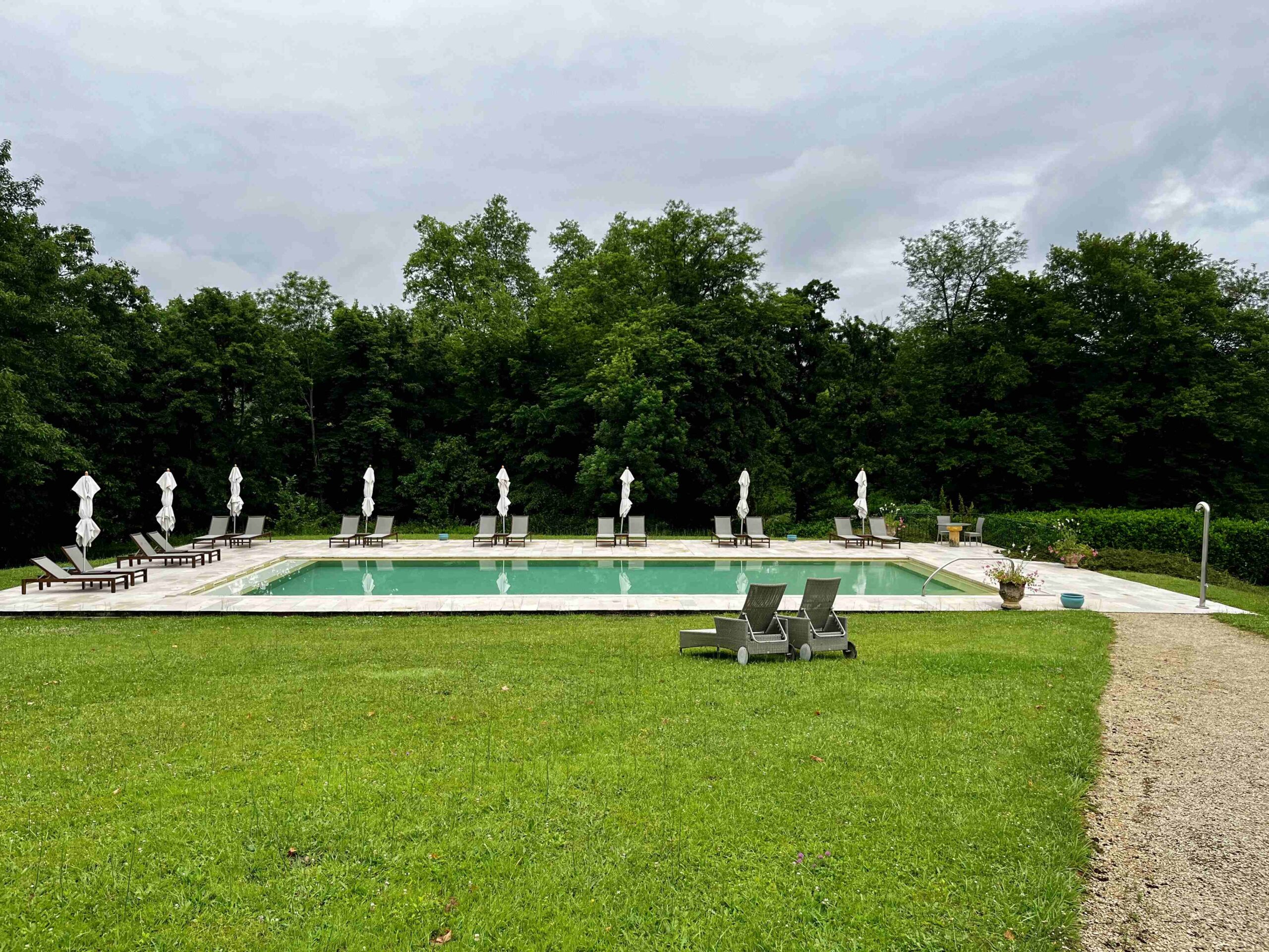 Heated infinity pool at Château de la Treyne castle hotel